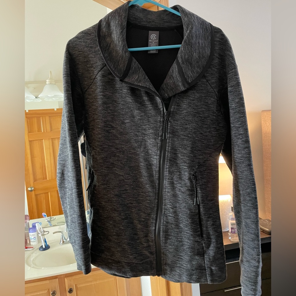Woman’s zip up size M